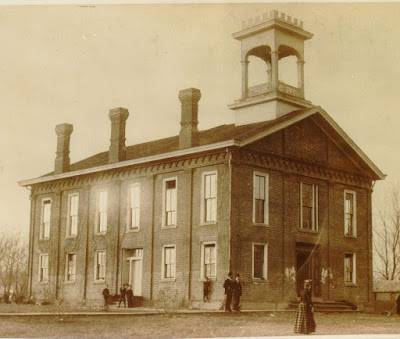 Photo of Yost Hall, the original building of Highland campus photographed in 1885.