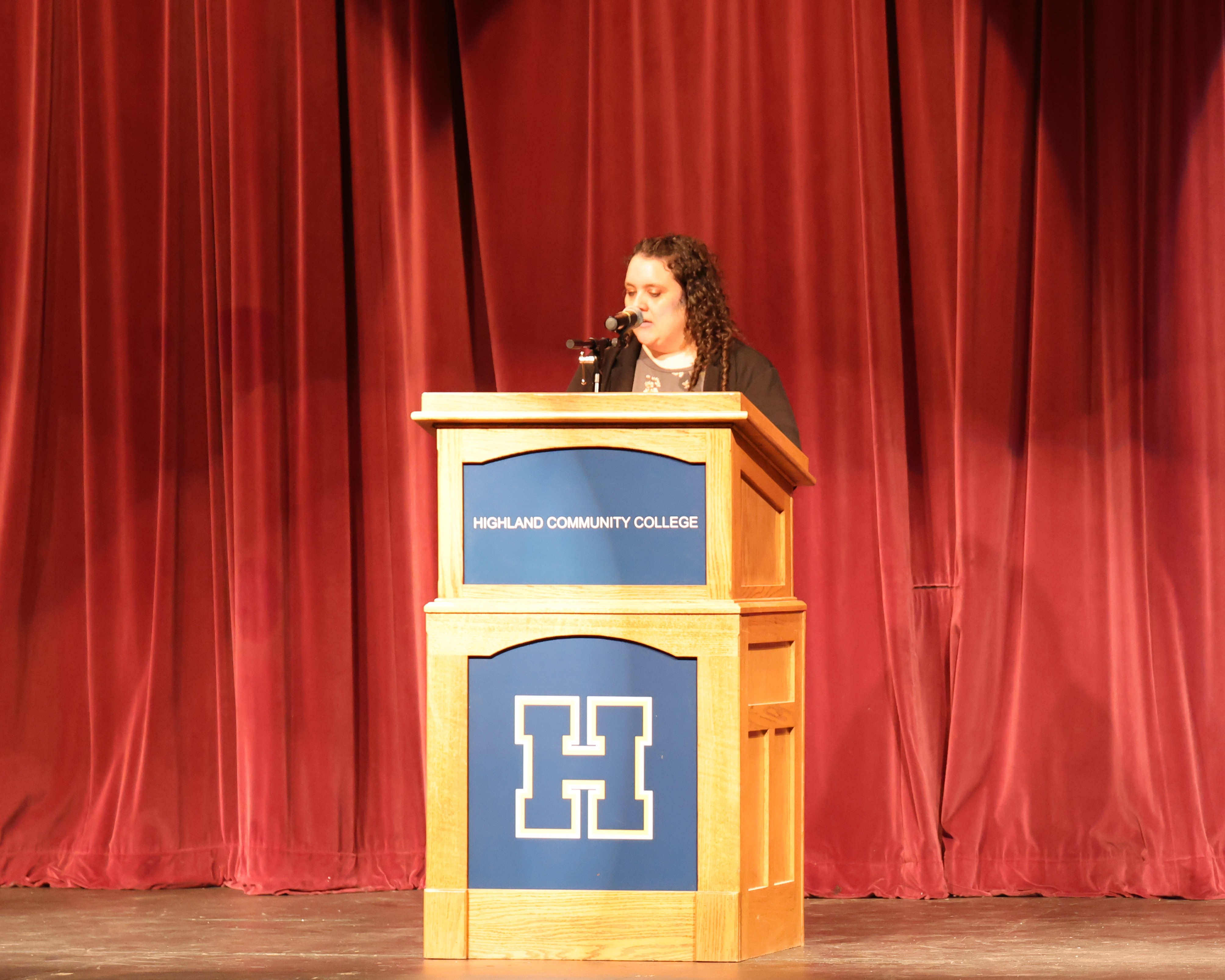 Dean of Students, Lexy Clark, greets everyone to the event.